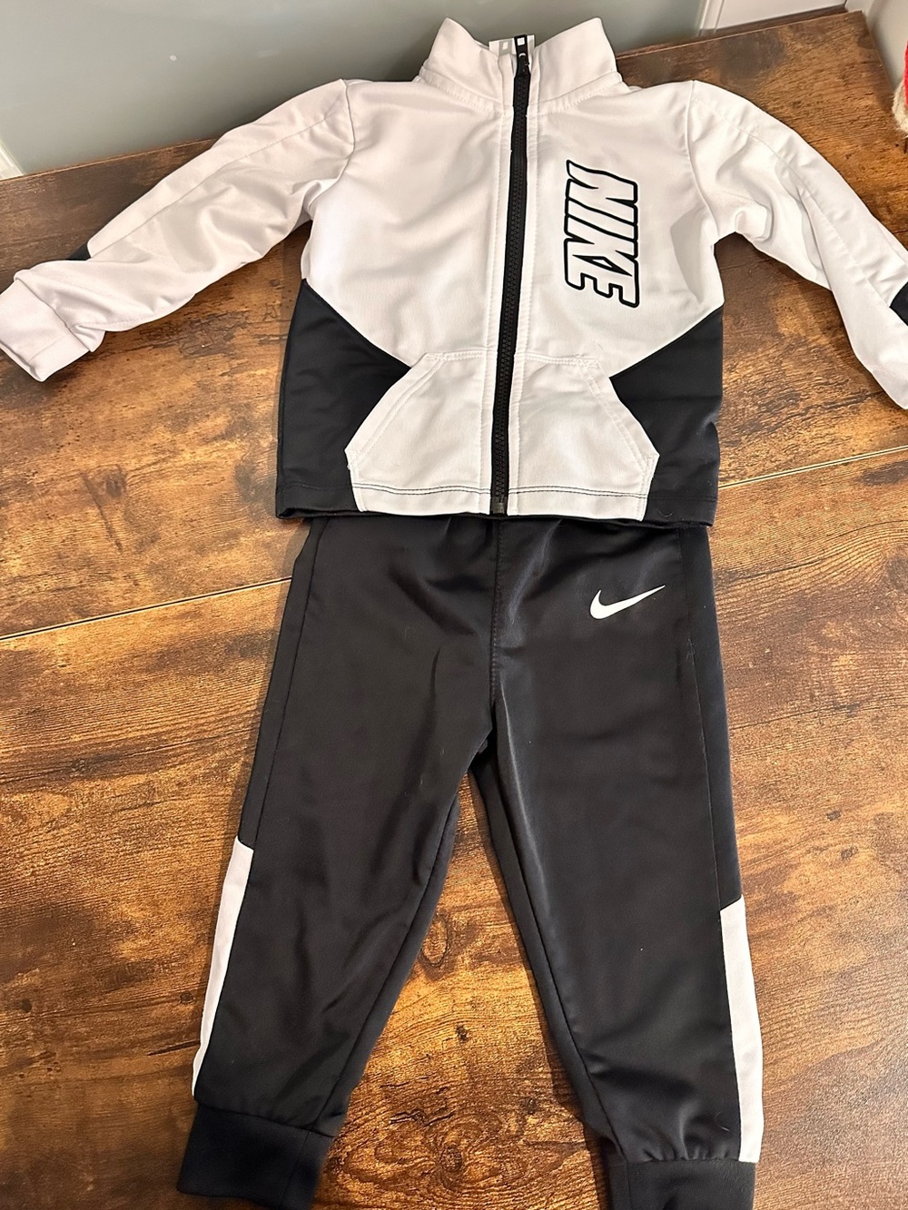 Nike Black and White Kids Two-Piece Athletic Track Set